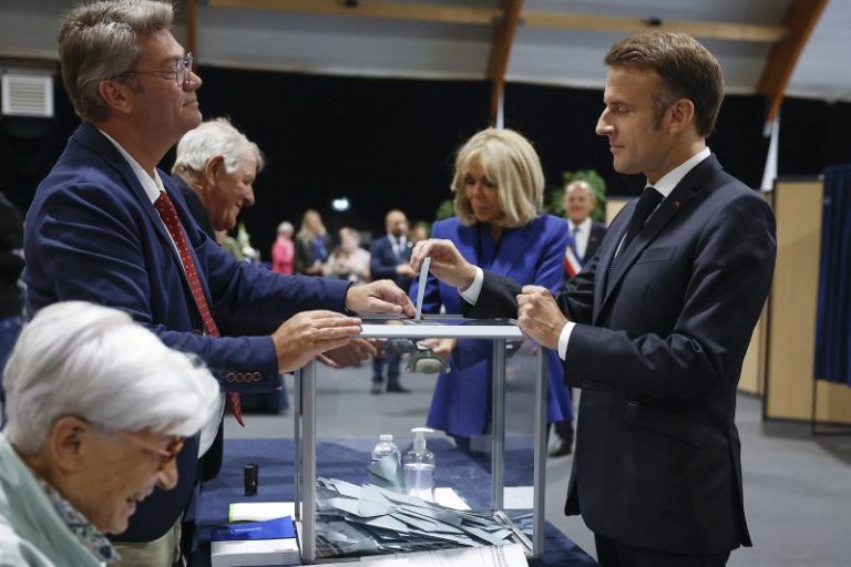 Macron urges new mainstream coalition, appearing to rule out working with the far left
